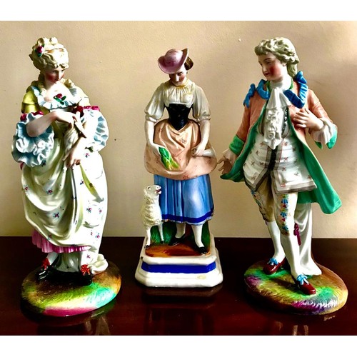184 - PAIR OF GLAZED POLYCHROME CONTINENTAL FIGURES (MINOR CHIPS) PLUS ANOTHER (AT FAULT), APPROXIMATELY 2... 