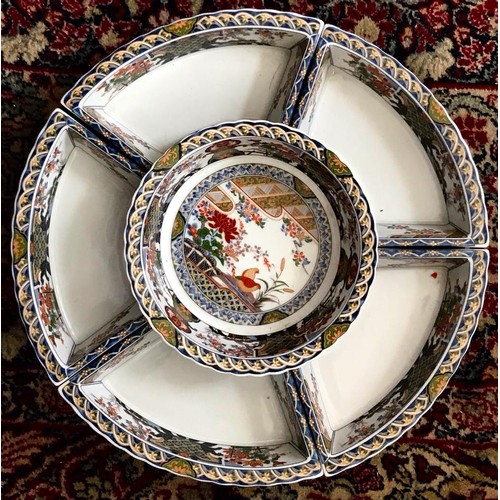 190 - JAPANESE MODERN REVOLVING HORS D'OEUVRES SET UPON REVOLVING PLASTIC STAND, DIAMETER APPROXIMATELY 36... 