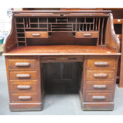 199 - Late 19th / Early 20th century oak roll top writing desk. Approx. 129cms H x 140cms W x 82cms D