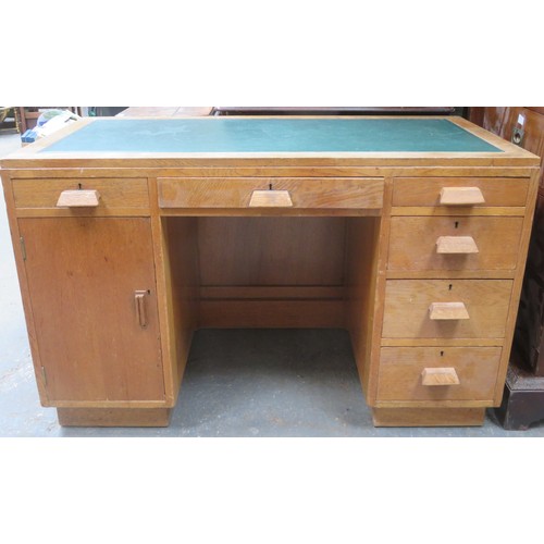 214 - Art Deco style oak kneehole writing desk with leather inserts. Approximately. 76cm H x 121.5cm W x 6... 
