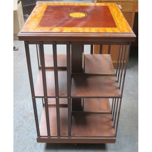 226 - 19th century shell inlaid mahogany revolving bookcase. Approximately. 85.5cm H x 54cm W