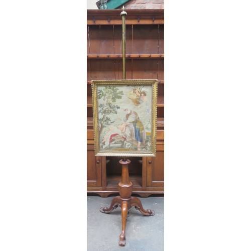 227 - RTV - 19th century mahogany adjustible pole screen on tripod supports, with gilded embroided religio... 