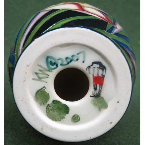 36 - Moorcroft tube line and glazed ceramic 'Spring Crocus' pattern freestanding egg form ornament, by Ke... 