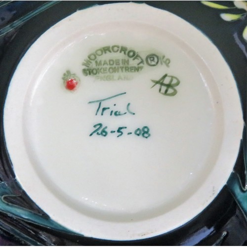 50 - Moorcroft Trial Piece - tube lined and glazed ceramic vase, with floral decoration and butterflies, ... 