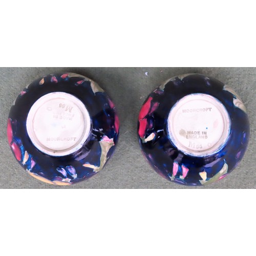 38 - Early 20th century Pair of Moorcroft Wisteria pattern glazed ceramic vases, stamped M55. Approx. 7cm... 