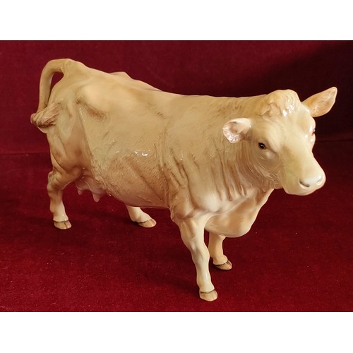 215 - BESWICK GLAZED CERAMIC CHAROLAIS COW, APPROX. 12.5CM H X 19.5CM L