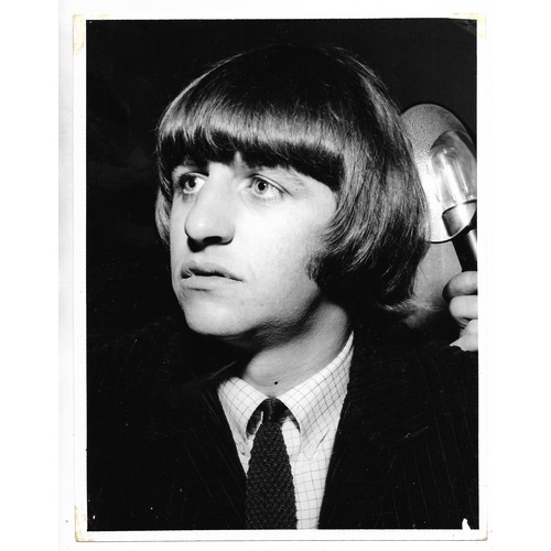 130 - A collection of five original photographs of members of The Beatles marked on reverse Graham Spencer... 