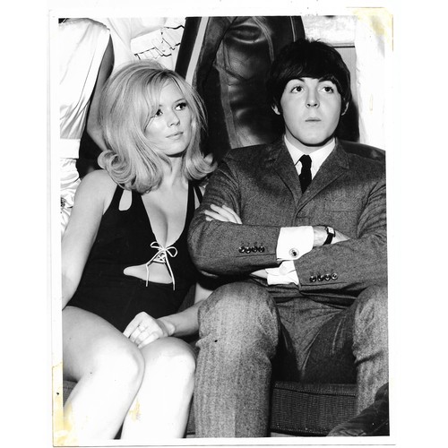 130 - A collection of five original photographs of members of The Beatles marked on reverse Graham Spencer... 