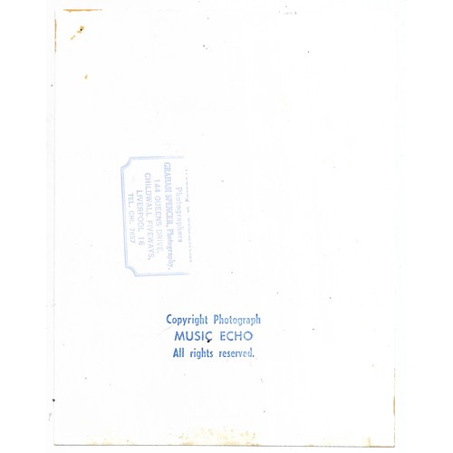 130 - A collection of five original photographs of members of The Beatles marked on reverse Graham Spencer... 