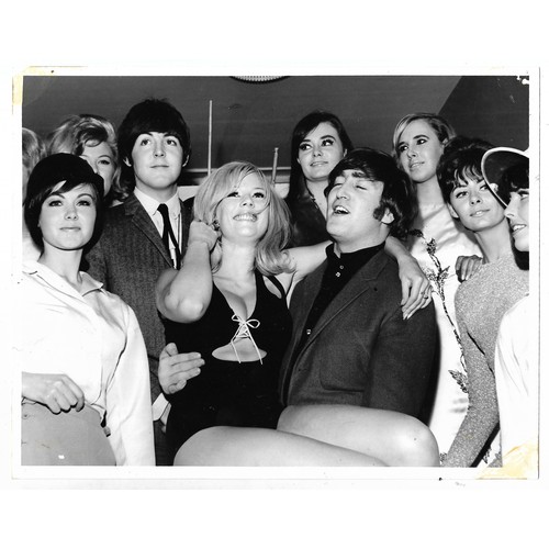 130 - A collection of five original photographs of members of The Beatles marked on reverse Graham Spencer... 