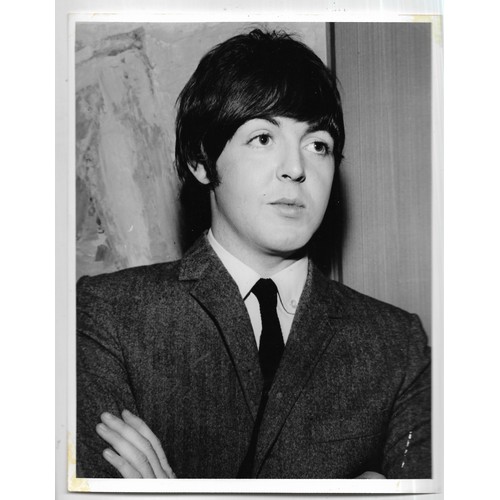 130 - A collection of five original photographs of members of The Beatles marked on reverse Graham Spencer... 
