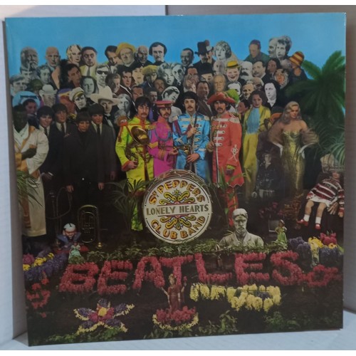 348 - Eighteen Beatles vinyls including Flowers of Liverpool A Tribute To The Beatles, Rock’n’Roll Vol 1 a... 