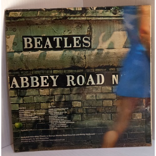 362 - The Beatles Abbey Road album with misaligned Apple sleeve signed on cover by Ken Townsend former man... 