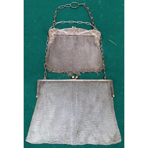 74 - Silver coloured Filigree and mesh evening purse, plus another larger silver coloured evening purse