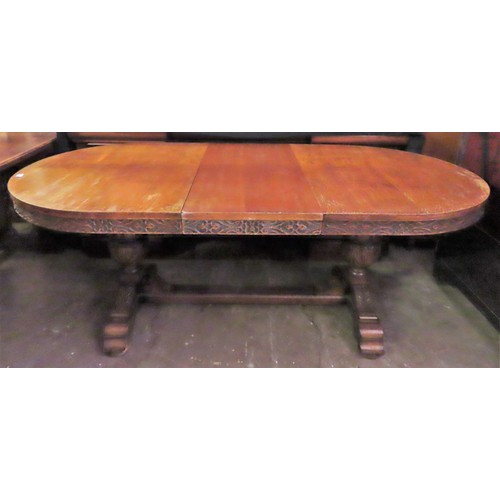 39 - Heavily carved early 20th century oak extending dining table with one leaf, plus five (4+1) similar ... 