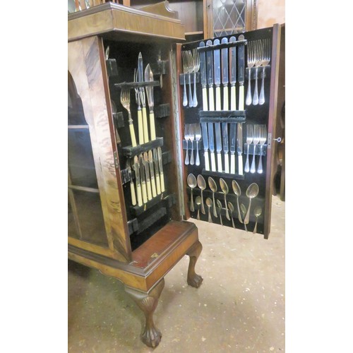 31 - Early 20th century walnut veneered bow fronted two door glazed display cabinet with hinged side comp... 