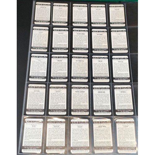 1 - Album of various brooke bond tea cards, some Canadian sets including education stamps with car + dif... 