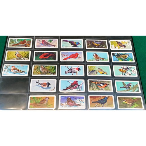 1 - Album of various brooke bond tea cards, some Canadian sets including education stamps with car + dif... 