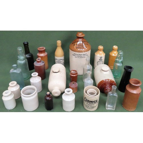 69 - Stoneware advertising flagon, plus various other stoneware pots, hot water bottle, glass bottles etc