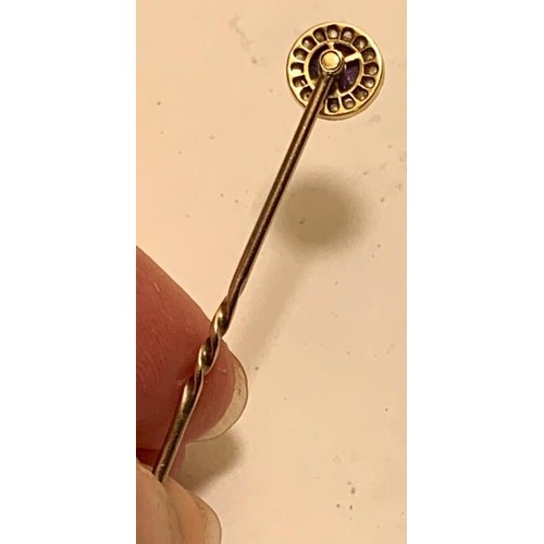 17 - UNMARKED GOLD COLOURED PIN WITH A CABOCHON CUT AMETHYST AND SIXTEEN VERY SMALL DIAMONDS, TOTAL WEIGH... 