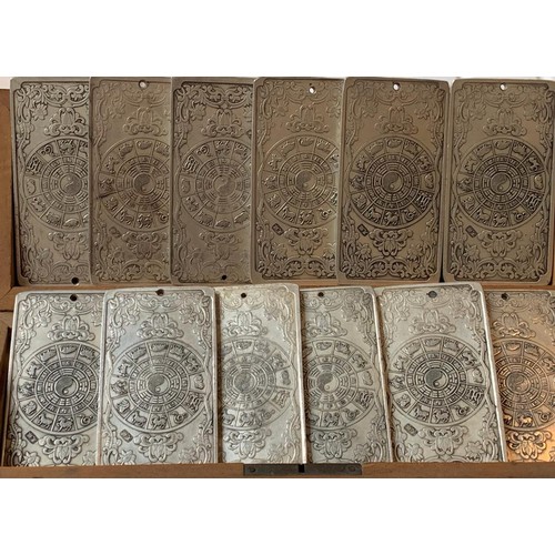 99 - TWELVE CHINESE VINTAGE SILVER COLOURED ZODIAC PLAQUES