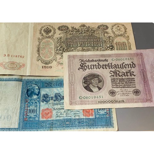 101 - ONE REICHSBANKNOTE 100MARK NOTE, ONE REICHSBANKNOTE 100,000MARK NOTE PLUS ONE 1910 100ROUBLES NOTES