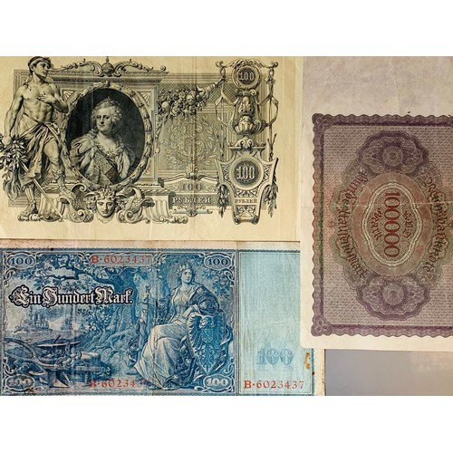 101 - ONE REICHSBANKNOTE 100MARK NOTE, ONE REICHSBANKNOTE 100,000MARK NOTE PLUS ONE 1910 100ROUBLES NOTES