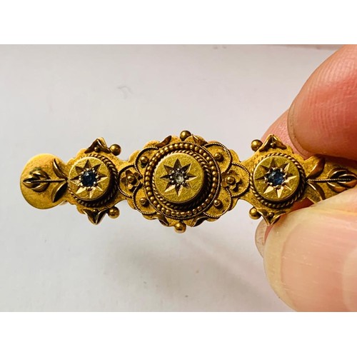 111 - 15ct GOLD VICTORIAN BROOCH SET WITH ONE VERY SMALL DIAMOND AND TWO VERY SMALL SAPPHIRES, TOTAL WEIGH... 