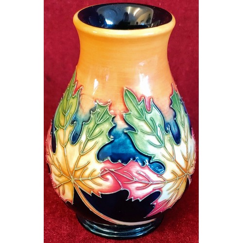 290 - MOORCROFT GLAZED CERAMIC VASE DESIGNED BY NICOLA SLANEY DEPICTING VARIOUS LEAVES, DATED 2012. APPROX... 