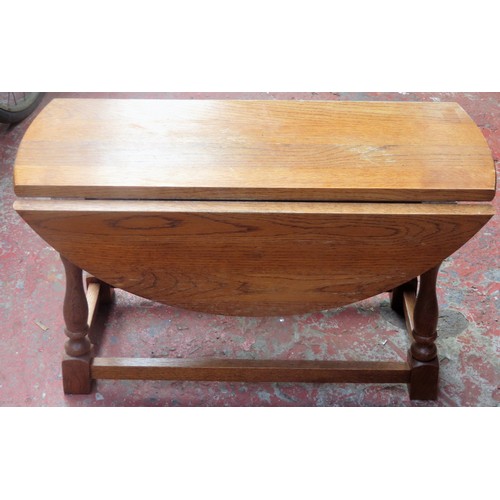 49 - Small 20th century Oak drop leaf table. Approx. 39cm H x 61cm W x 62cm D