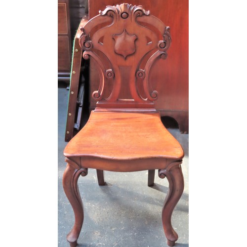 19 - Victorian Mahogany shield back piercework decorated hall chair. Approx. 90cm H x 44cm W x 43cm D