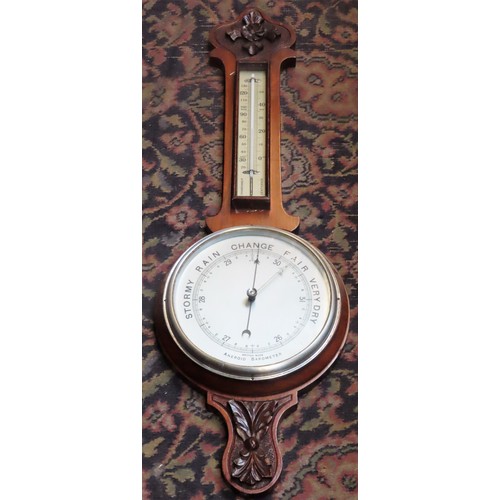 96 - Early 20th century carved mahogany aneroid barometer. Approx. 80 x 25cm