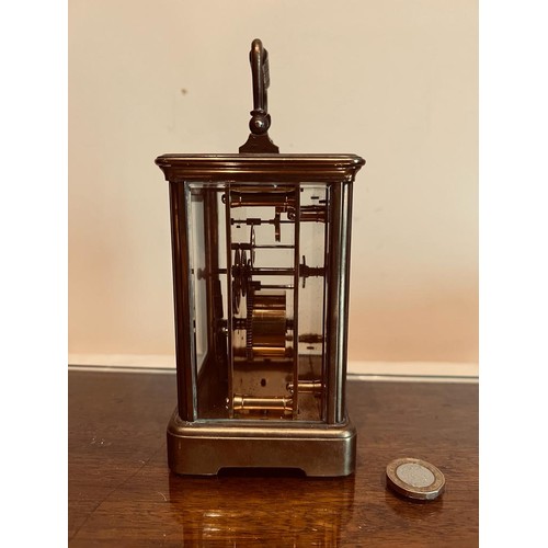 208 - BRASS CASED 'CARRIAGE CLOCK' TIMEPIECE WITH KEY, APPROXIMATELY 13cm HIGH