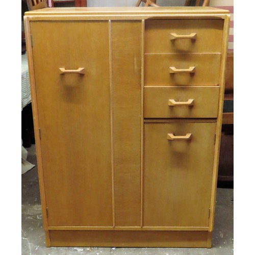 67 - G Plan mid 20th century light oak tall boy/small wardrobe with pull out mirror. Approx. 122cm H x 88... 