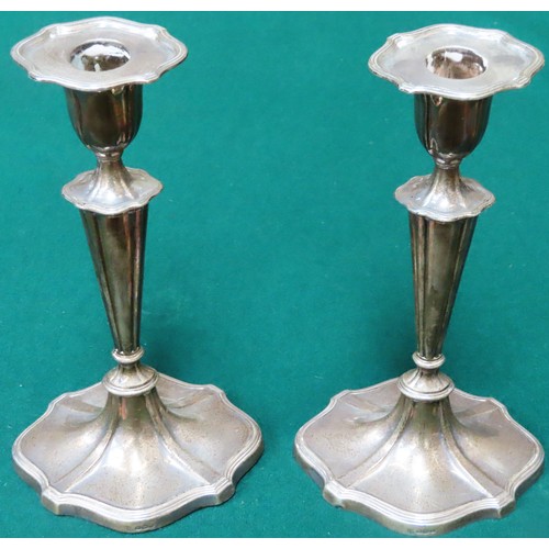 232 - Pair of hallmarked silver candlesticks, by James Deakin & Sons (John & William F Deakin), Sheffield ... 