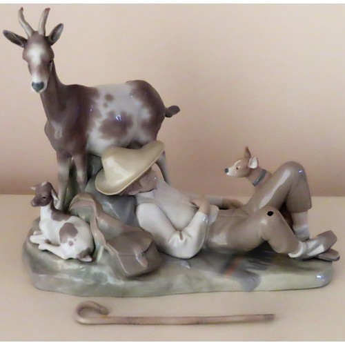 26 - Large Lladro glazed ceramic figure group depicting animals and a young boy sleeping. Approx. 35cm H ... 