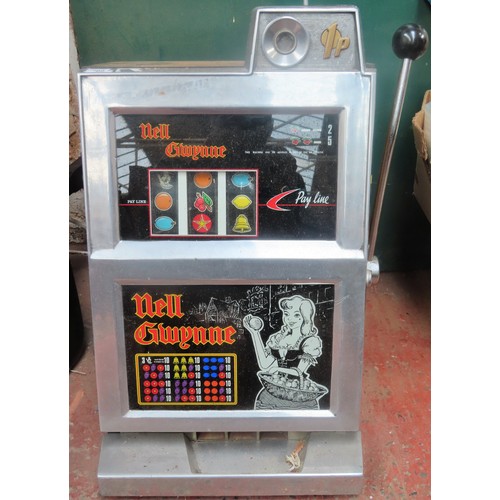 119 - Mid 20th century Nell Gwynne 1p one armed bandit fruit machine. Approx. 67cms H x 39cms W x 44cms D