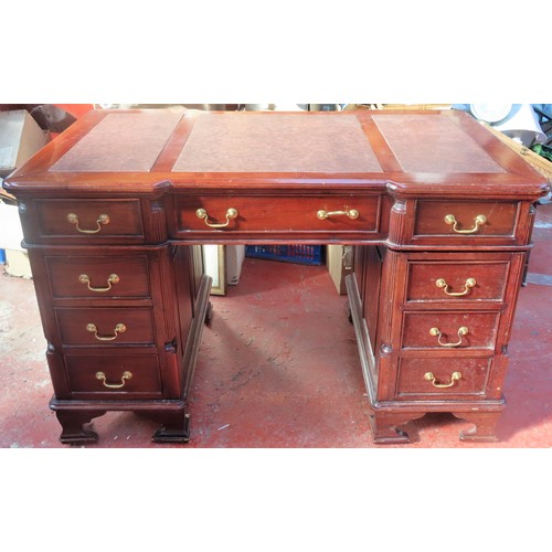 21 - 20th century mahogany nine drawer pedestal writing desk, with leather effect insert. Approx. 78cms H... 