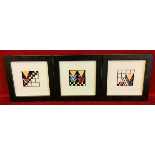 133 - SET OF THREE FRAMED MOORCROFT DERNGATE PATTERN CERAMIC PLAQUES, DESIGNED BY EMMA BOSSONS. APPROX. 9.... 