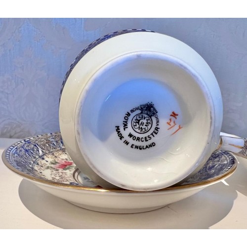 41 - PAIR OF ROYAL WORCESTER CABINET CUPS AND SAUCERS