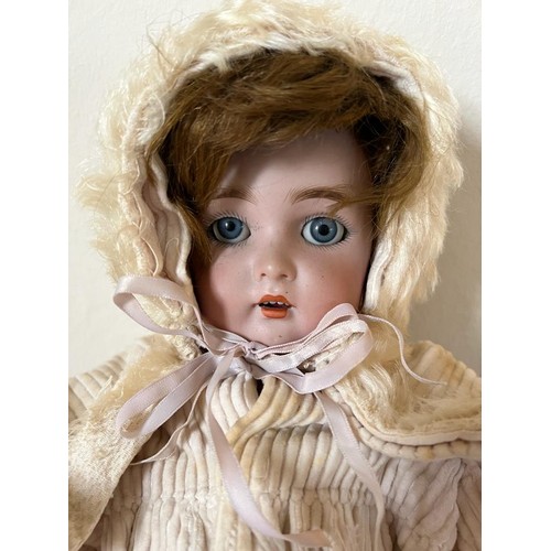 67 - KAMMER & REINHARDT PORCELAIN HEADED DOLL, 20th CENTURY CLOTHING, APPROX 48cm LONG