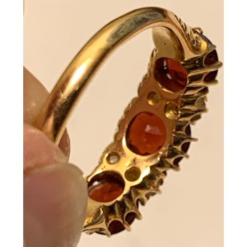 223 - 18ct GOLD RING SET WITH ONE GARNET APPROX 1.75ct, TWO GARNETS APPROX 1ct, FOUR DIAMONDS APPROX 0.04c... 