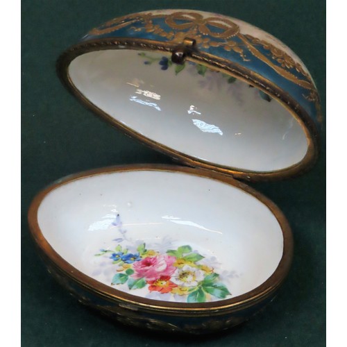 77 - Large 19th century egg form porcelain storage box, in the Serves manner