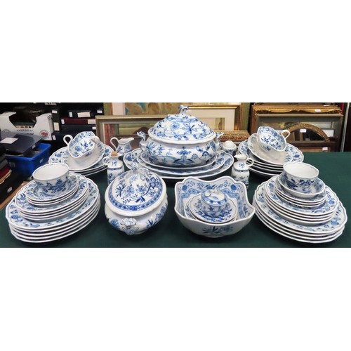 25 - Large quantity of blue and white dinnerware, some pieces stamped with German backstamps including Me... 