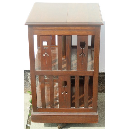 42 - Early 20th century Art Nouveau oak revolving bookcase. Approx. 79cms H x 46cms W x 45cms D