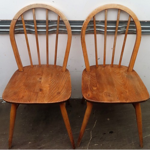 256 - Pair of mid 20th century Ercol style stick back chairs. Approx. 86cms H x 39cms W x 39cms D