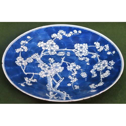 227 - 19th century Oriental Prunus pattern ceramic charger. Approx. 34.5cms D