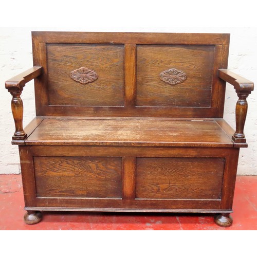 75 - Early 20th century carved oak monks bench, with lift up seat and carved decoration. Approx. 90cms H ... 