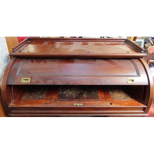 12 - 19th century mahogany roll top desk with fitted interior on pedestal supports. Approx. 114cm H x 121... 