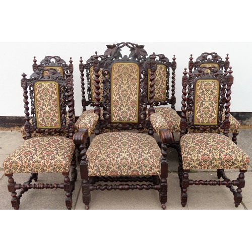 21 - Set of Seven (6+1) early 20th century heavily carved oak barley twist chairs